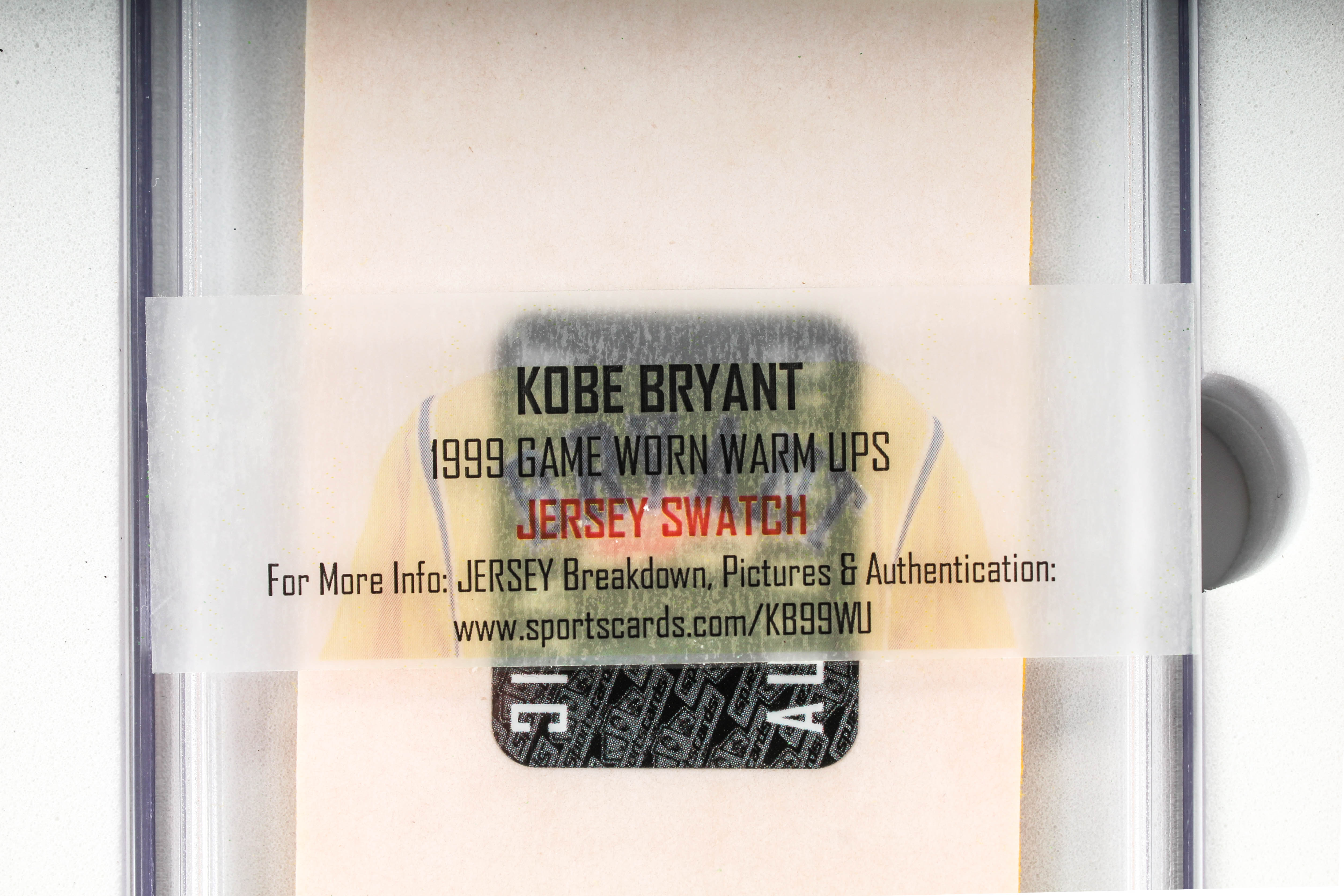 Lot of (2) Kobe Bryant Items With Signed NBA Basketball With Display Case & 1999 Game Worn Warm Ups Piece (Beckett LOA & PSA Hologram) at PristineAuction.com Lot of (2) Kobe Bryant Items With Signed NBA Basketball With Display Case & 1999 Game Worn Warm Ups Piece (Beckett LOA & PSA Hologram) at PristineAuction.com