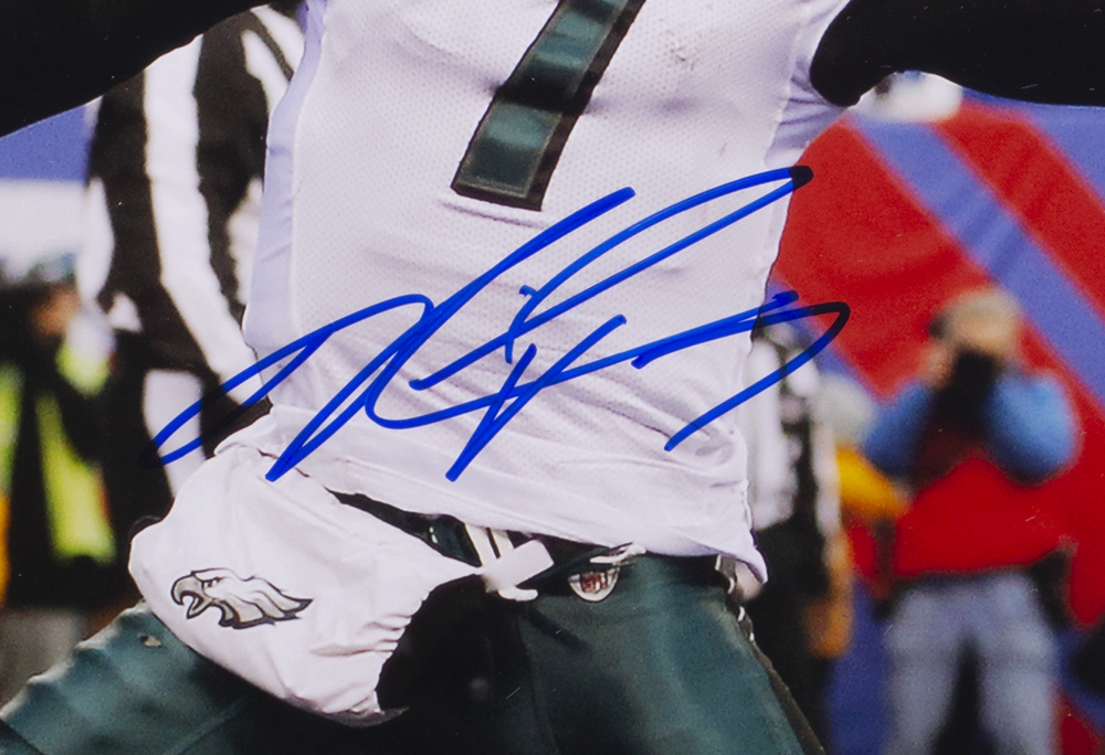 Michael Vick Signed Eagles 22x27 Custom Framed Photo Display with (2) Eagles Medallions Inscribed "Miracle At The New Meadowlands" (PSA COA & Vick Hologram) at PristineAuction.com Michael Vick Signed Eagles 22x27 Custom Framed Photo Display with (2) Eagles Medallions Inscribed "Miracle At The New Meadowlands" (PSA COA & Vick Hologram) at PristineAuction.com