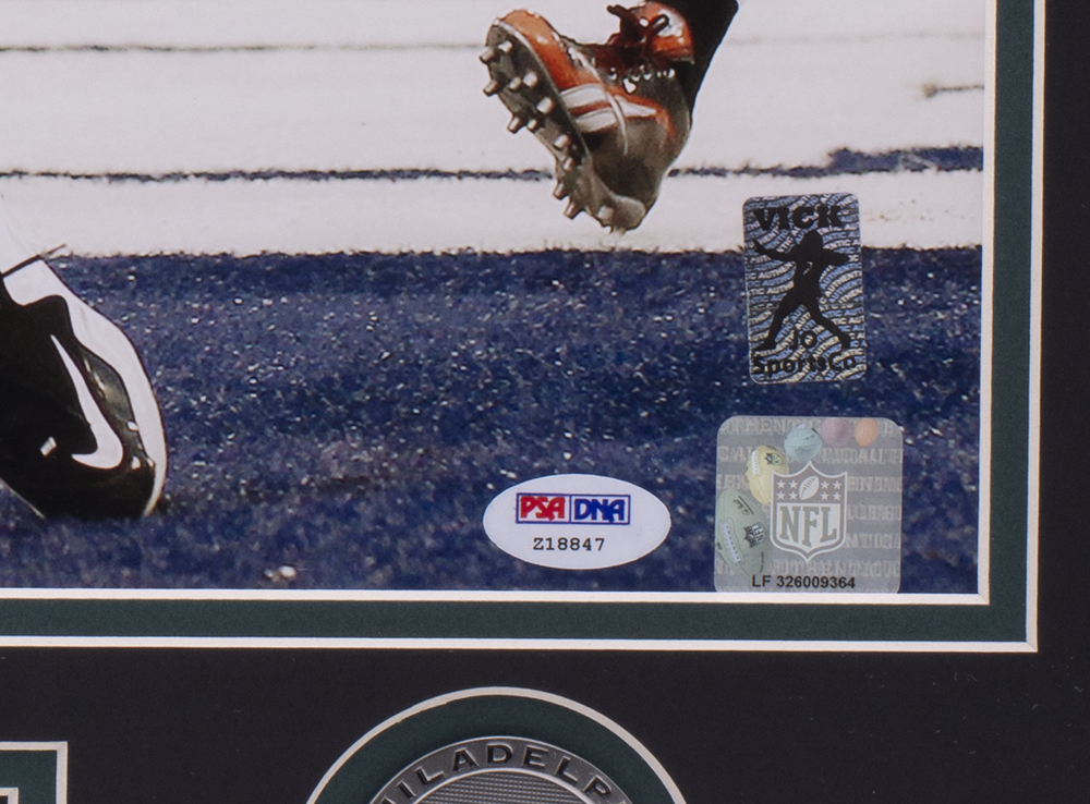 Michael Vick Signed Eagles 22x27 Custom Framed Photo Display with (2) Eagles Medallions Inscribed "Miracle At The New Meadowlands" (PSA COA & Vick Hologram) at PristineAuction.com Michael Vick Signed Eagles 22x27 Custom Framed Photo Display with (2) Eagles Medallions Inscribed "Miracle At The New Meadowlands" (PSA COA & Vick Hologram) at PristineAuction.com