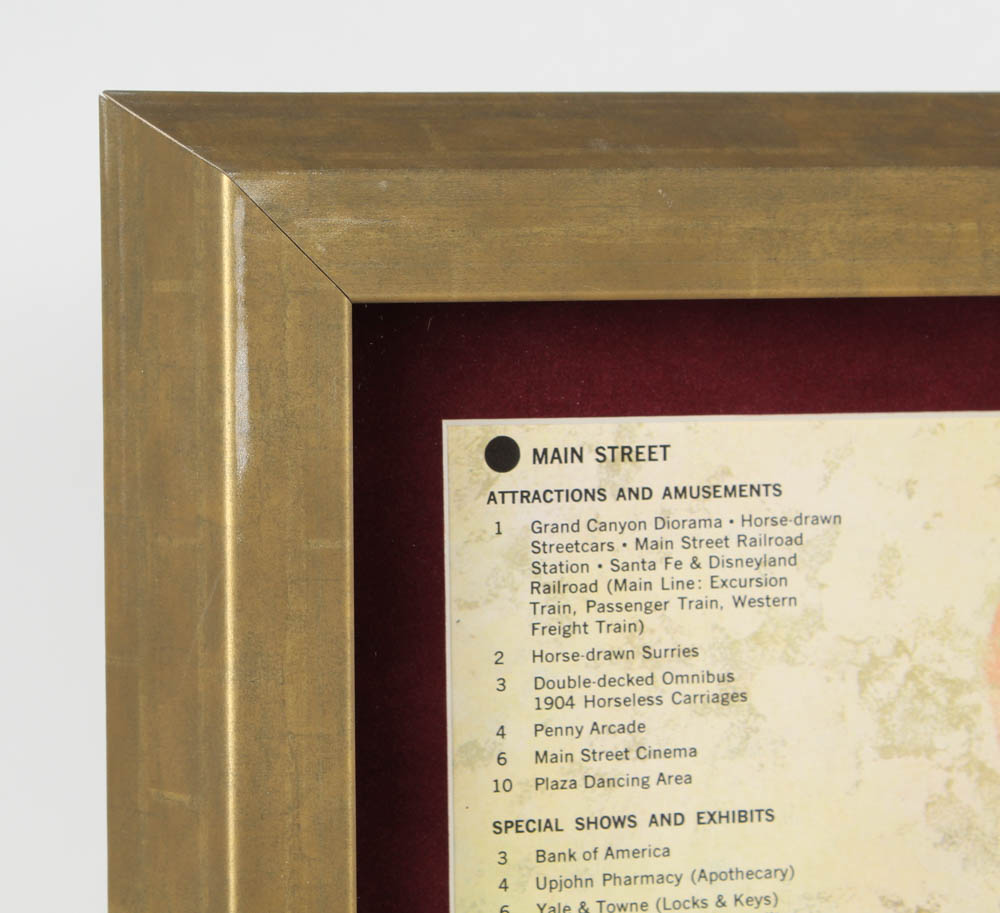 1963 Disneyland Map 16x26 Custom Framed Print Display with Vintage Ticket Book & Vintage Souvenir Spoon at PristineAuction.com 1963 Disneyland Map 16x26 Custom Framed Print Display with Vintage Ticket Book & Vintage Souvenir Spoon at PristineAuction.com