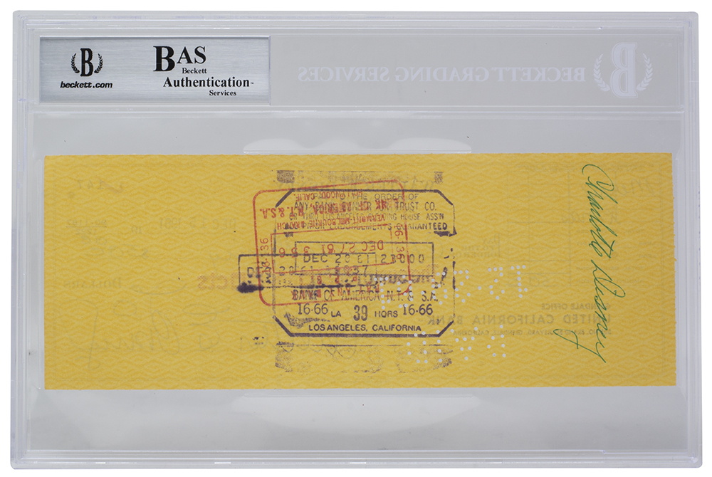 Walt Disney Signed 1961 Personal Check (BAS Encapsulated) at PristineAuction.com Walt Disney Signed 1961 Personal Check (BAS Encapsulated) at PristineAuction.com