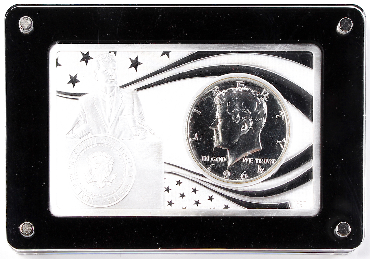 John F. Kennedy 100th Anniversary 2 oz. .999 Silver Bar with 1964 Kennedy Half Dollar at PristineAuction.com John F. Kennedy 100th Anniversary 2 oz. .999 Silver Bar with 1964 Kennedy Half Dollar at PristineAuction.com