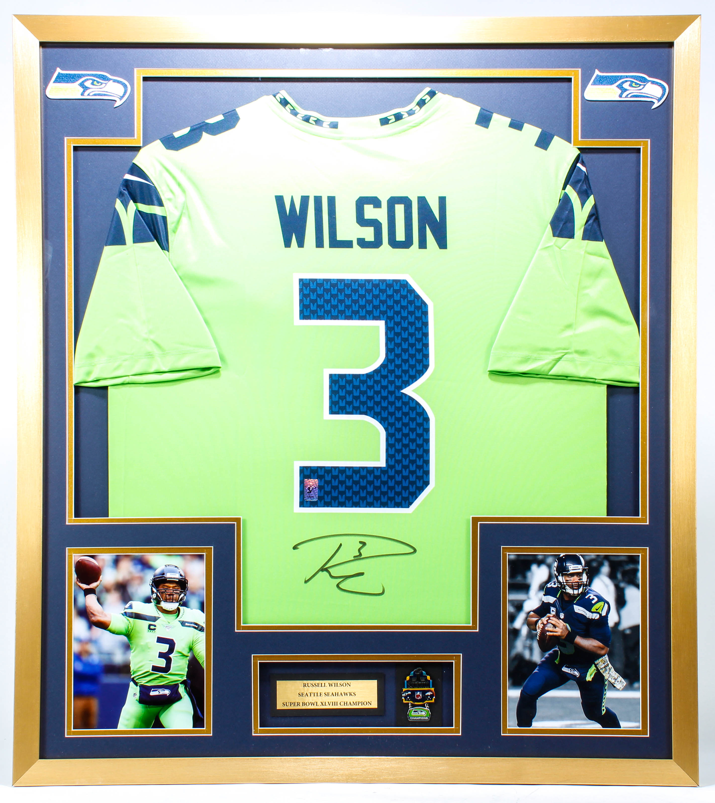 Russell Wilson Signed 32x36 Custom Framed Jersey Display with Super Bowl Pin (Wilson COA) at PristineAuction.com Russell Wilson Signed 32x36 Custom Framed Jersey Display with Super Bowl Pin (Wilson COA) at PristineAuction.com