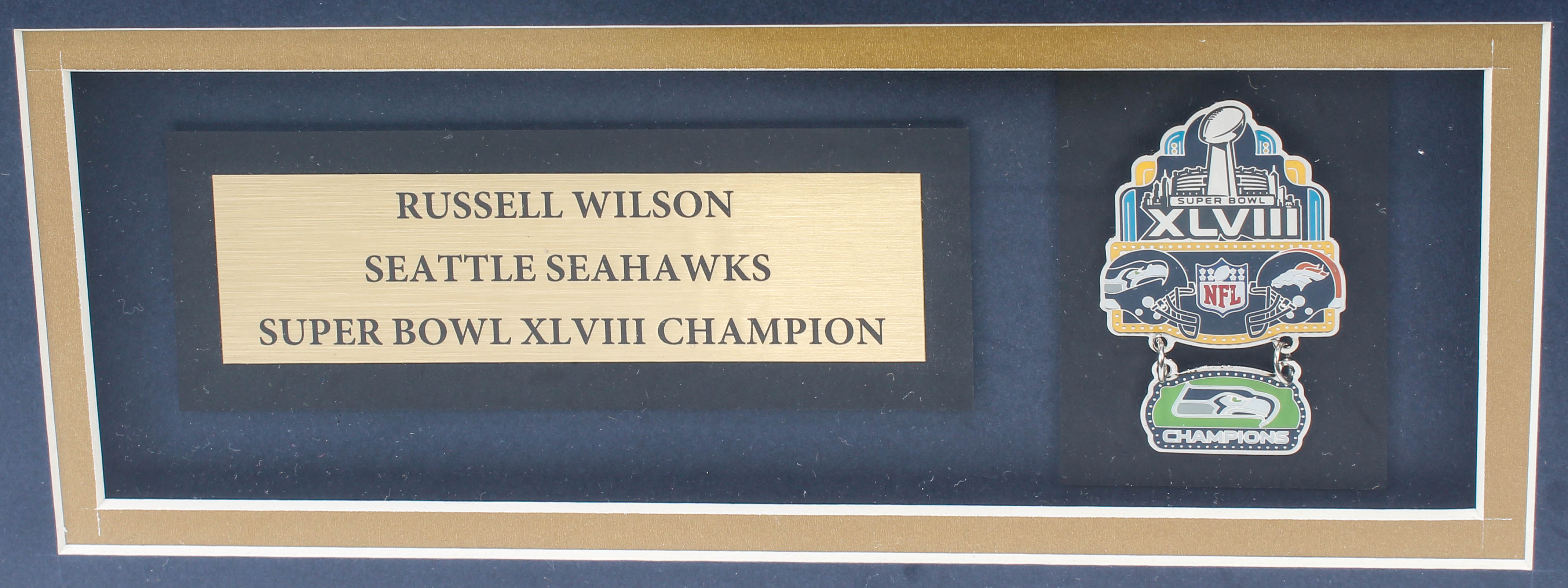 Russell Wilson Signed 32x36 Custom Framed Jersey Display with Super Bowl Pin (Wilson COA) at PristineAuction.com Russell Wilson Signed 32x36 Custom Framed Jersey Display with Super Bowl Pin (Wilson COA) at PristineAuction.com