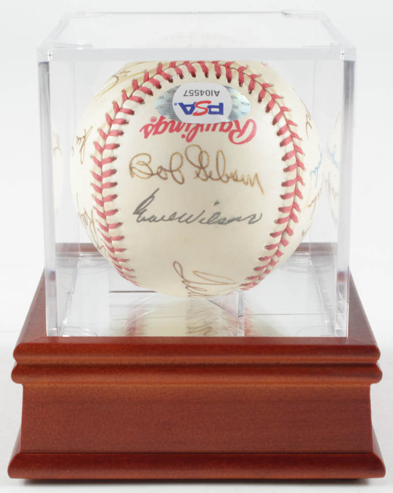 1992 World Series Baseball Team-Signed by (13) With Ted Williams, Larry Doby, Warren Spahn, Bob Gibson, Joe Garagiola With Display Case (PSA LOA) at PristineAuction.com 1992 World Series Baseball Team-Signed by (13) With Ted Williams, Larry Doby, Warren Spahn, Bob Gibson, Joe Garagiola With Display Case (PSA LOA) at PristineAuction.com