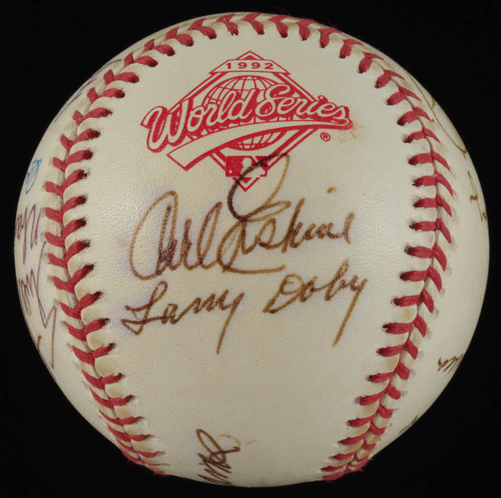 1992 World Series Baseball Team-Signed by (13) With Ted Williams, Larry Doby, Warren Spahn, Bob Gibson, Joe Garagiola With Display Case (PSA LOA) at PristineAuction.com 1992 World Series Baseball Team-Signed by (13) With Ted Williams, Larry Doby, Warren Spahn, Bob Gibson, Joe Garagiola With Display Case (PSA LOA) at PristineAuction.com