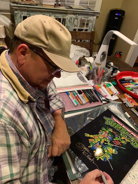 Kevin Eastman Signed 11x14 Photo with Hand-Drawn Turtles Sketch (PA COA) at PristineAuction.com Kevin Eastman Signed 11x14 Photo with Hand-Drawn Turtles Sketch (PA COA) at PristineAuction.com