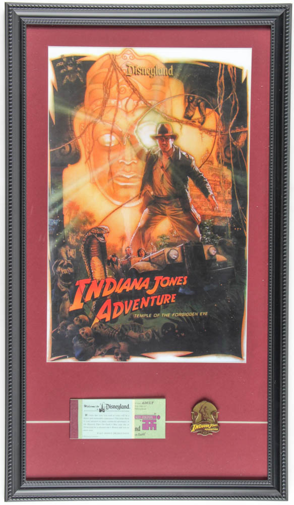 Disneyland "Indiana Jones Adventure: Temple of the Forbidden Eye" 15x26 Custom Framed Poster Print with Vintage Ticket & Indiana Jones Pin at PristineAuction.com Disneyland "Indiana Jones Adventure: Temple of the Forbidden Eye" 15x26 Custom Framed Poster Print with Vintage Ticket & Indiana Jones Pin at PristineAuction.com