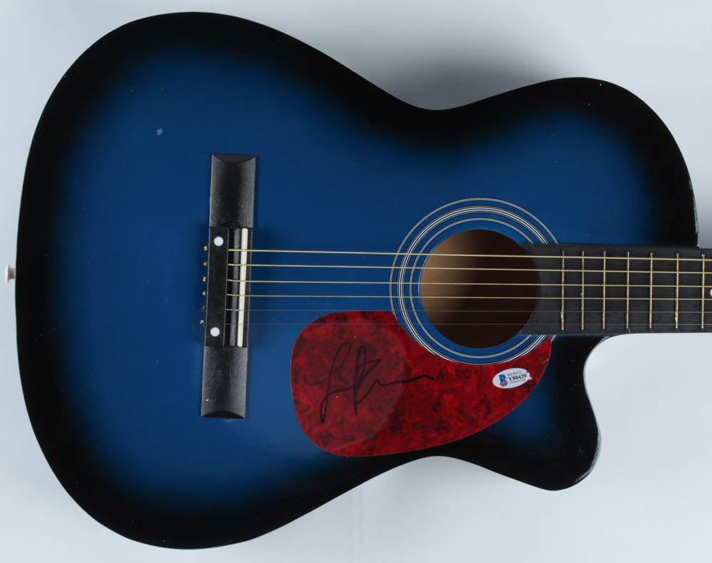 Lionel Richie Signed 38" Acoustic Guitar (Beckett COA) (See Description) at PristineAuction.com Lionel Richie Signed 38" Acoustic Guitar (Beckett COA) (See Description) at PristineAuction.com