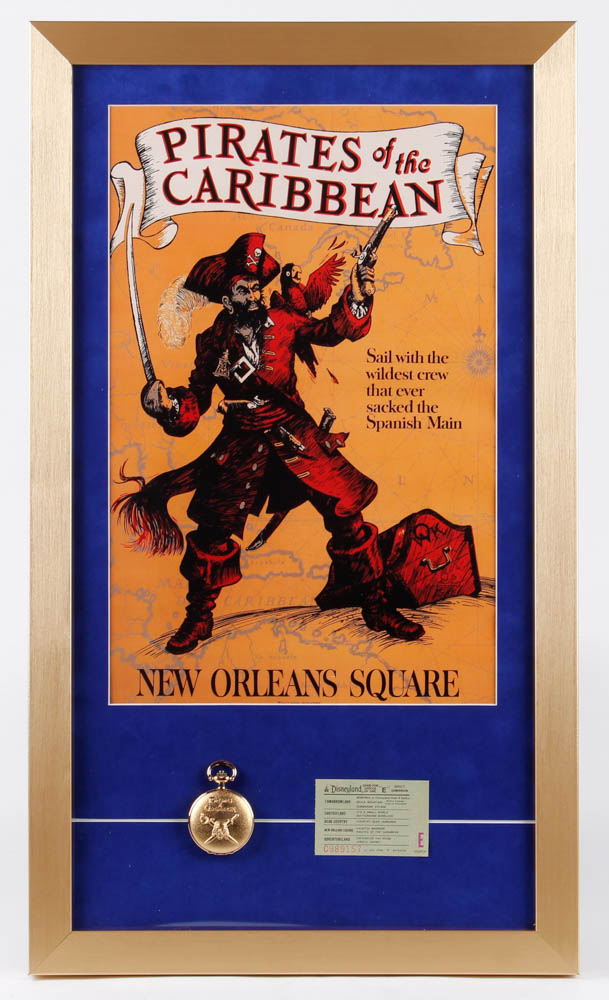 Disneyland "Pirates of the Caribbean" 15x26 Custom Framed Print with Pirates of the Caribbean Souvenir Pocket Watch & Vintage Disneyland E Ride Ticket at PristineAuction.com Disneyland "Pirates of the Caribbean" 15x26 Custom Framed Print with Pirates of the Caribbean Souvenir Pocket Watch & Vintage Disneyland E Ride Ticket at PristineAuction.com