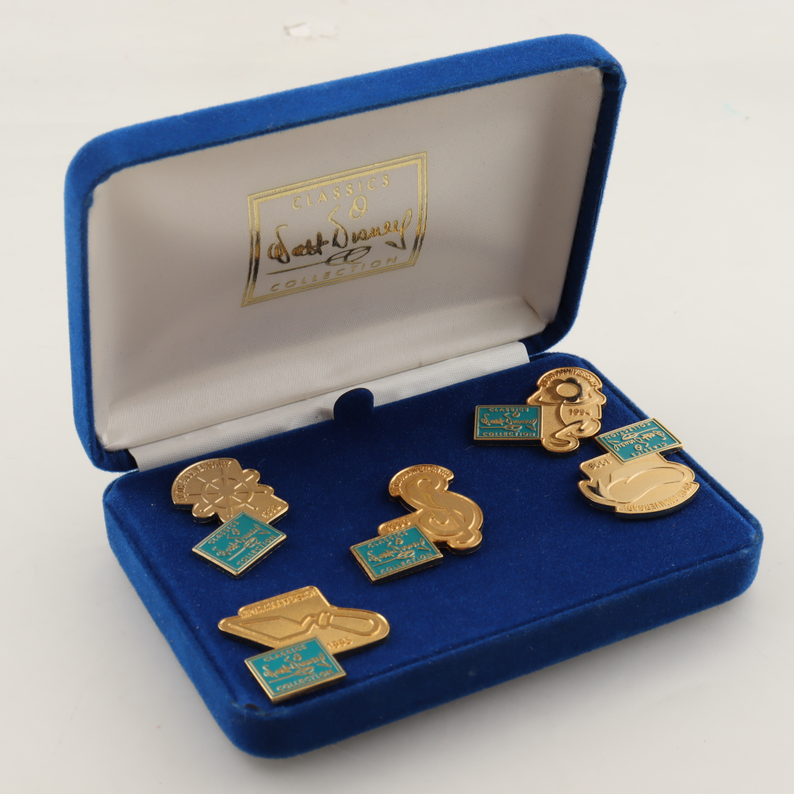 Set of (5) Vintage Walt Disney Classics Collection 5th Anniversary Pins at PristineAuction.com Set of (5) Vintage Walt Disney Classics Collection 5th Anniversary Pins at PristineAuction.com