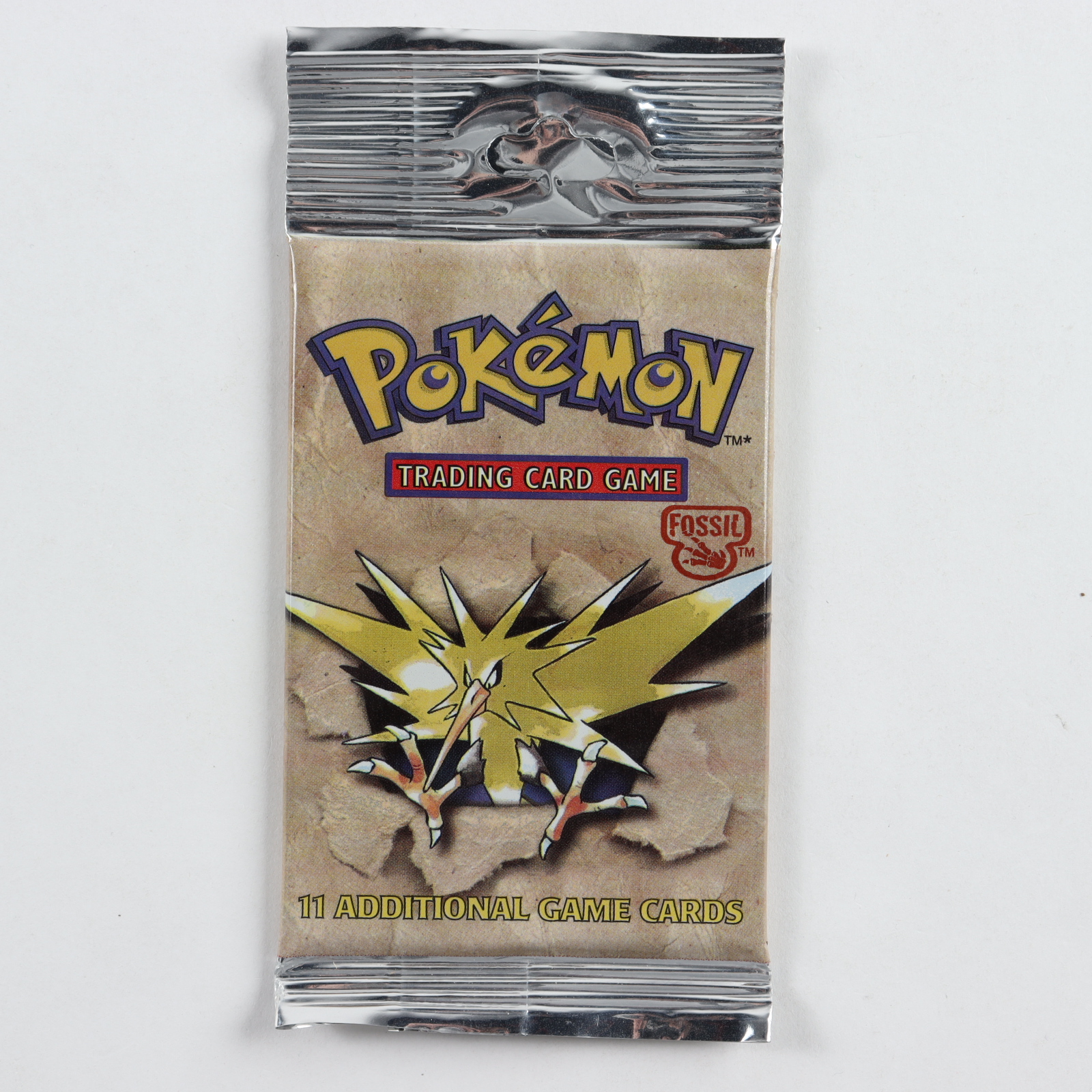 Pokemon Base Set Fossil Booster Pack with (11) Cards at PristineAuction.com Pokemon Base Set Fossil Booster Pack with (11) Cards at PristineAuction.com