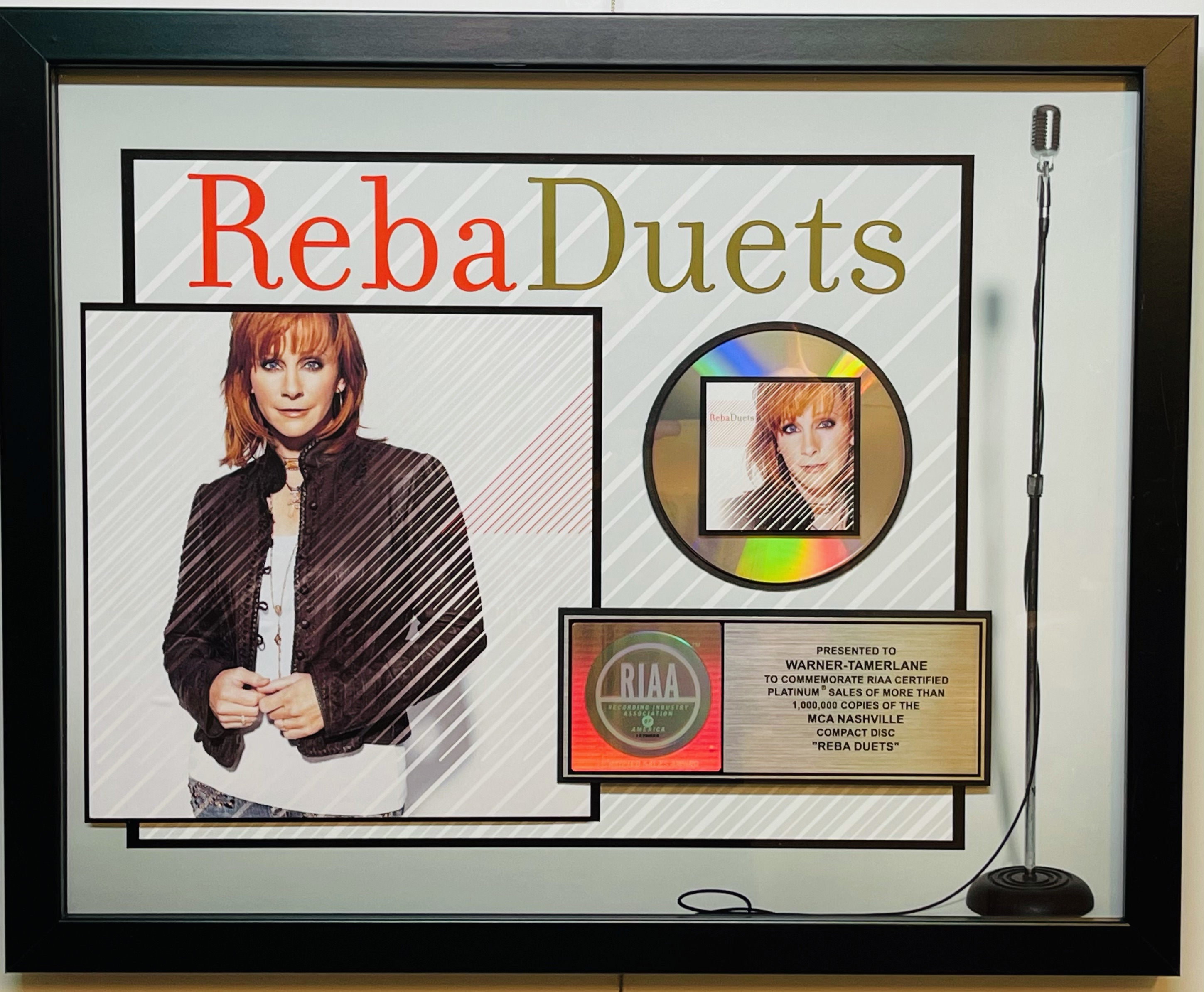 Reba McEntire "Duets" 17.5x21.5 Custom Framed Platinum 1,000,000 Sales Award at PristineAuction.com Reba McEntire "Duets" 17.5x21.5 Custom Framed Platinum 1,000,000 Sales Award at PristineAuction.com