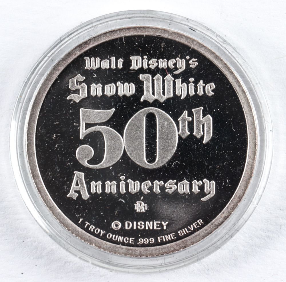 1987 LE Walt Disney's 50th Anniversary Snow White's "The Witch" 1 Troy Ounce Fine Silver Coin at PristineAuction.com 1987 LE Walt Disney's 50th Anniversary Snow White's "The Witch" 1 Troy Ounce Fine Silver Coin at PristineAuction.com