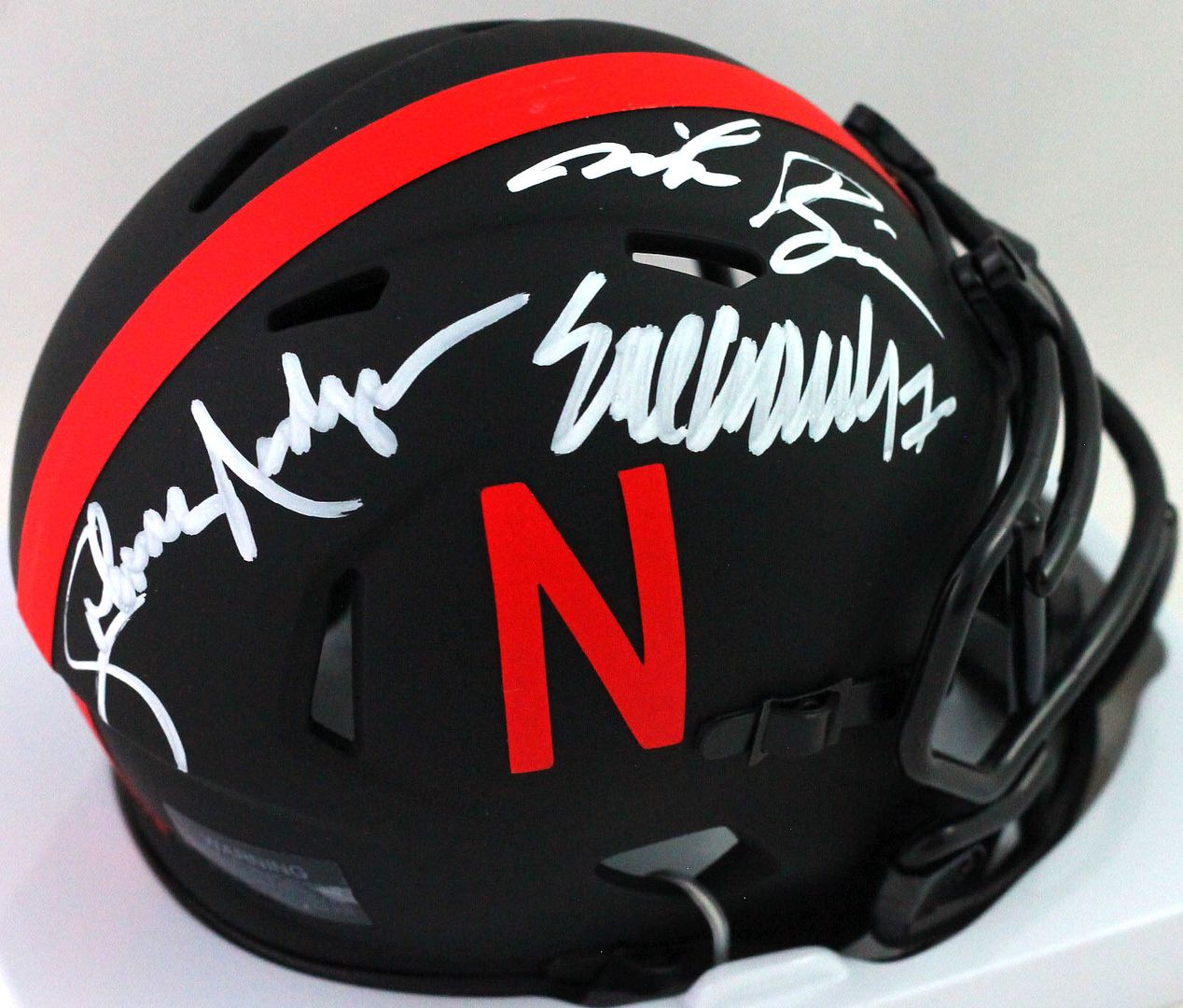 Johnny Rodgers, Mike Rozier, & Eric Crouch Signed Nebraska Cornhuskers Eclipse Alternate Speed Mini Helmet (JSA) at PristineAuction.com Johnny Rodgers, Mike Rozier, & Eric Crouch Signed Nebraska Cornhuskers Eclipse Alternate Speed Mini Helmet (JSA) at PristineAuction.com