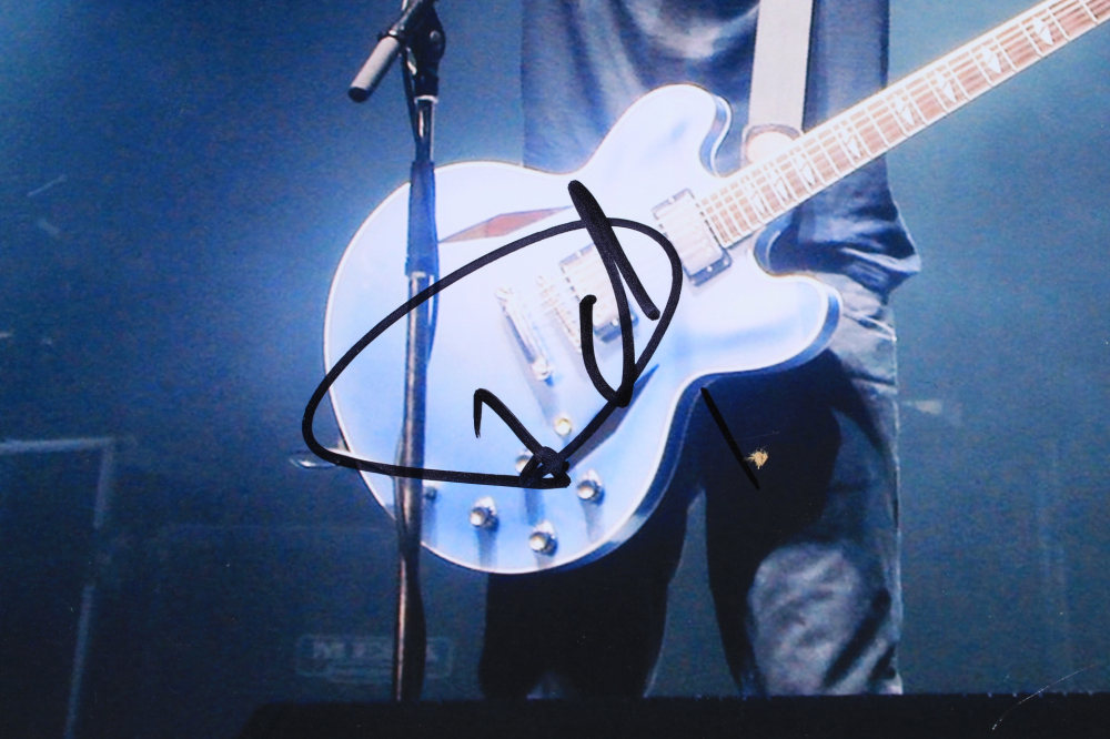 Dave Grohl Signed 11x14 Photo (JSA COA) Pristine Auction