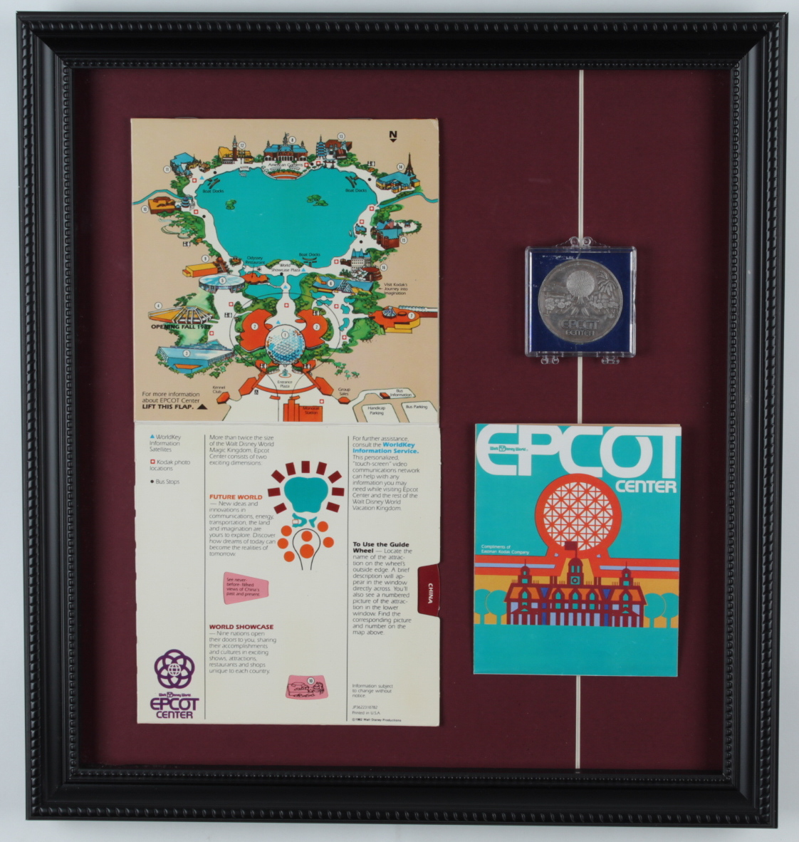 Vintage Disney World 15x16 Custom Framed Epcot Center Map Display with Vintage Epcot Center Information Pamphlet & Silver Coin (See Description) at PristineAuction.com Vintage Disney World 15x16 Custom Framed Epcot Center Map Display with Vintage Epcot Center Information Pamphlet & Silver Coin (See Description) at PristineAuction.com