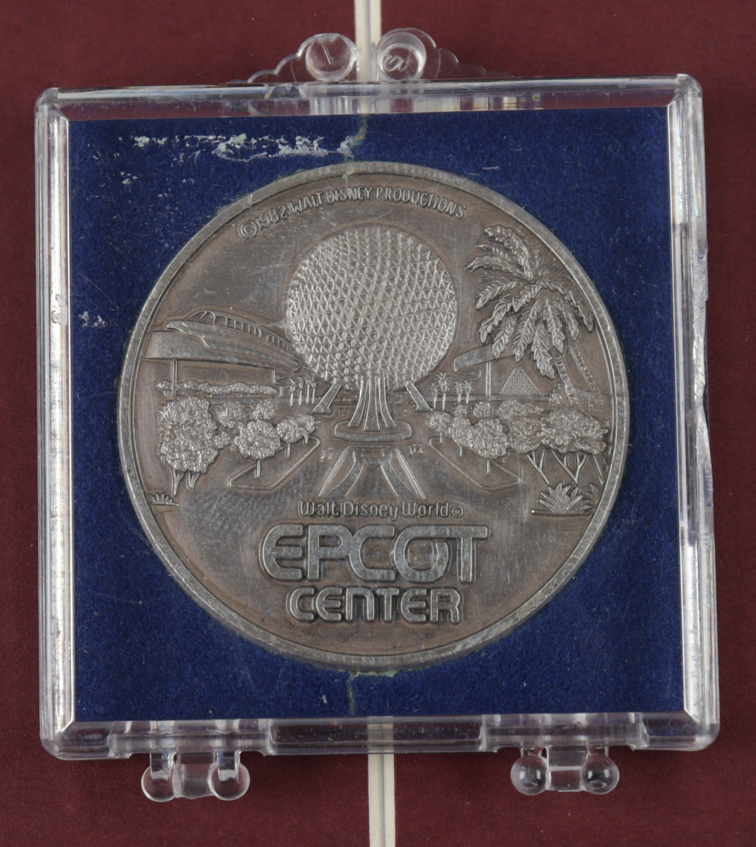 Vintage Disney World 15x16 Custom Framed Epcot Center Map Display with Vintage Epcot Center Information Pamphlet & Silver Coin (See Description) at PristineAuction.com Vintage Disney World 15x16 Custom Framed Epcot Center Map Display with Vintage Epcot Center Information Pamphlet & Silver Coin (See Description) at PristineAuction.com