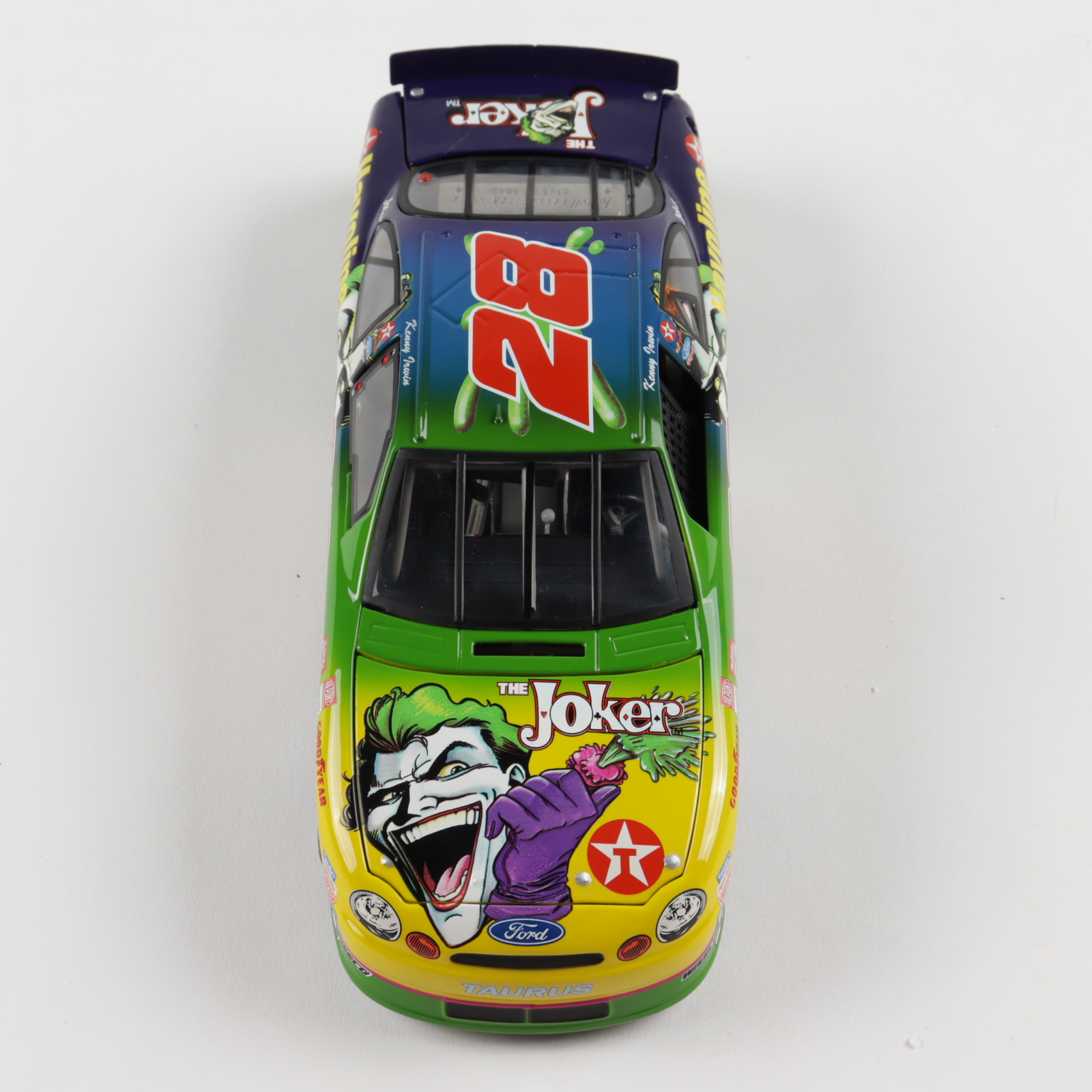 Kenny Irwin LE #28 Joker 1998 Ford Taurus 1:24 Scale Die Cast Car with Display Case at PristineAuction.com Kenny Irwin LE #28 Joker 1998 Ford Taurus 1:24 Scale Die Cast Car with Display Case at PristineAuction.com