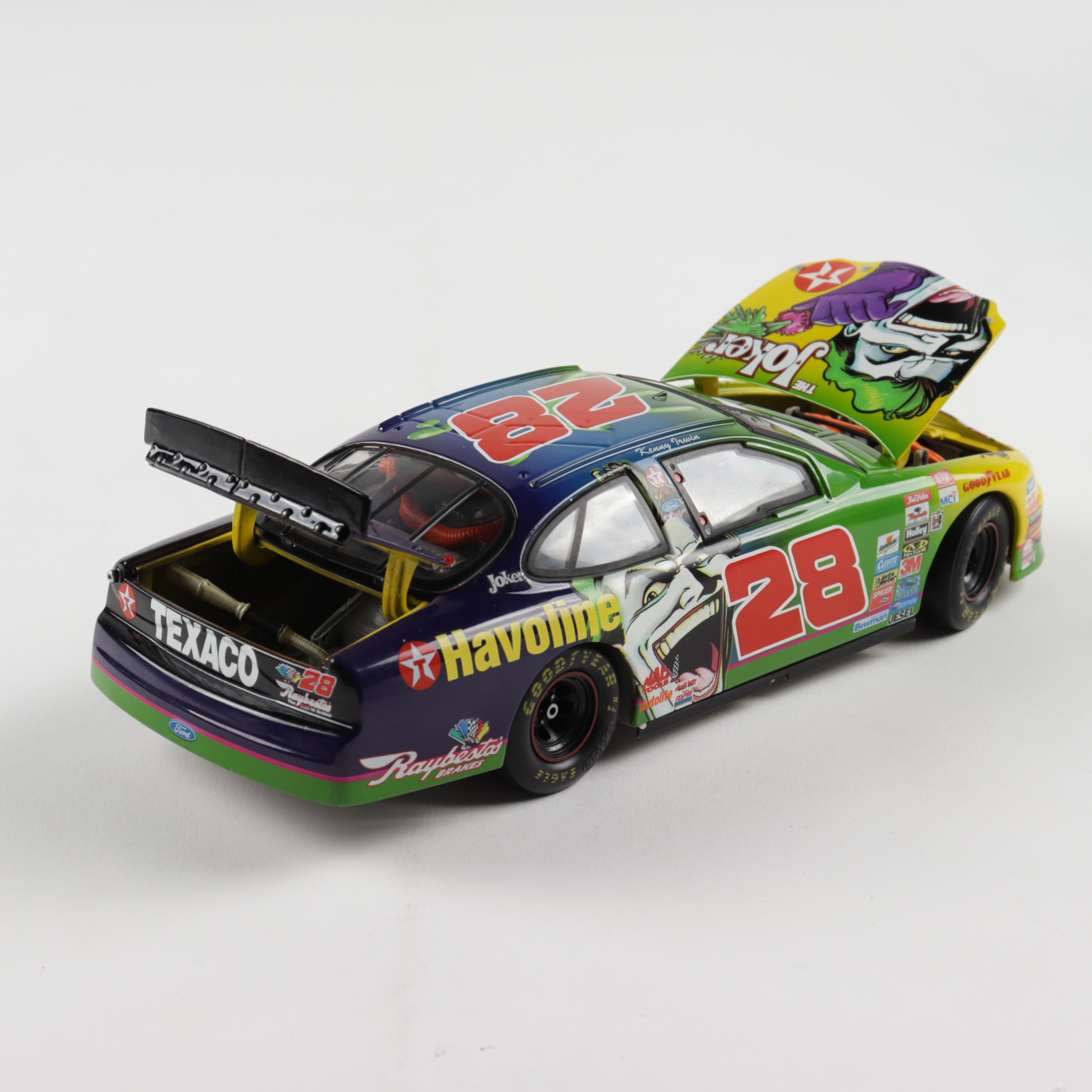 Kenny Irwin LE #28 Joker 1998 Ford Taurus 1:24 Scale Die Cast Car with Display Case at PristineAuction.com Kenny Irwin LE #28 Joker 1998 Ford Taurus 1:24 Scale Die Cast Car with Display Case at PristineAuction.com