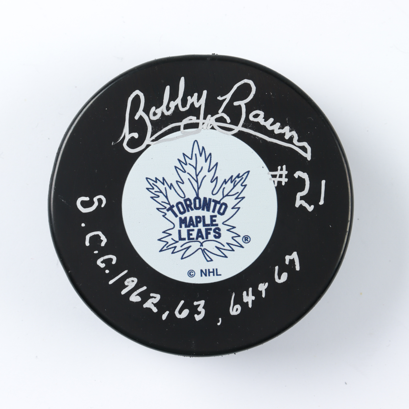Bobby Baun Signed Maple Leafs Logo Hockey Puck Inscribed "S.C.C. 1962, 63, 64 & 67" (COJO COA) at PristineAuction.com Bobby Baun Signed Maple Leafs Logo Hockey Puck Inscribed "S.C.C. 1962, 63, 64 & 67" (COJO COA) at PristineAuction.com