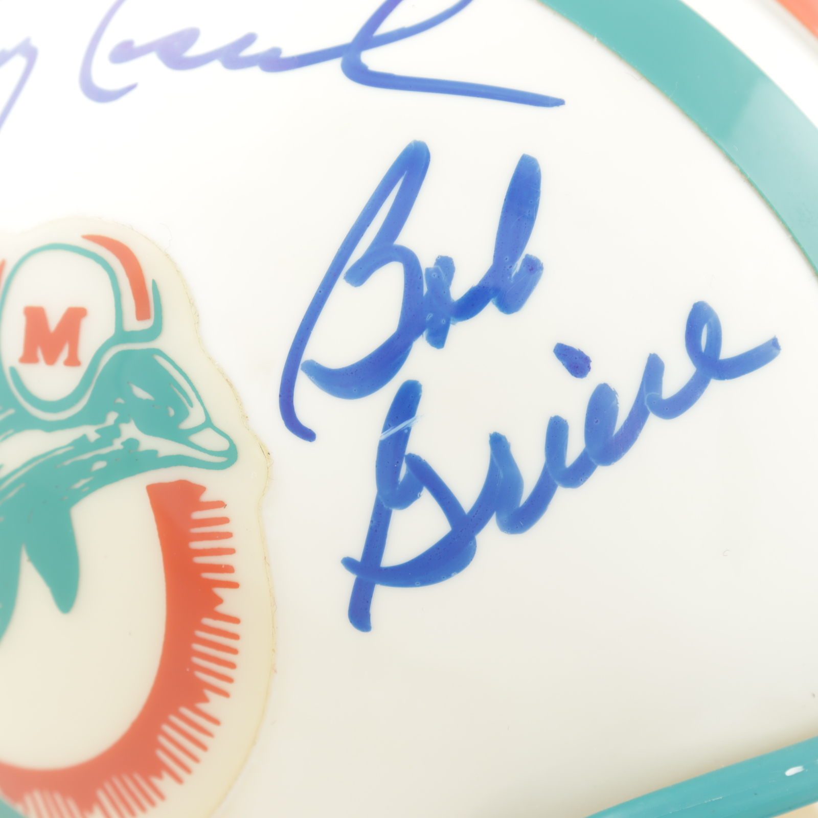 Dolphins Mini Helmet Signed by (5) with Bob Griese, Larry Csonka, Paul Warfield, Earl Morrall, & Jim Kiick (Beckett LOA) (See Description) at PristineAuction.com Dolphins Mini Helmet Signed by (5) with Bob Griese, Larry Csonka, Paul Warfield, Earl Morrall, & Jim Kiick (Beckett LOA) (See Description) at PristineAuction.com