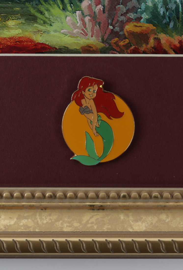 Thomas Kinkade Walt Disney's "The Little Mermaid" 16x16 Custom Framed Print Display with The Little Mermaid Pin (See Description) at PristineAuction.com Thomas Kinkade Walt Disney's "The Little Mermaid" 16x16 Custom Framed Print Display with The Little Mermaid Pin (See Description) at PristineAuction.com
