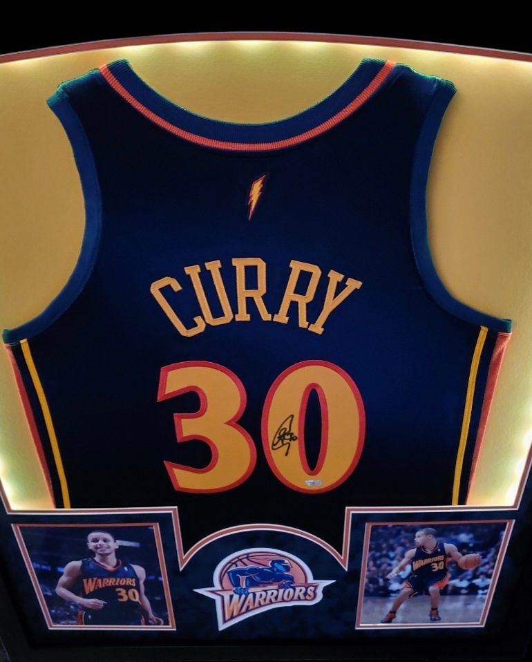 Stephen Curry Signed Warriors 32x41 Custom Framed Jersey Display with LED Lights (Fanatics Hologram) at PristineAuction.com Stephen Curry Signed Warriors 32x41 Custom Framed Jersey Display with LED Lights (Fanatics Hologram) at PristineAuction.com