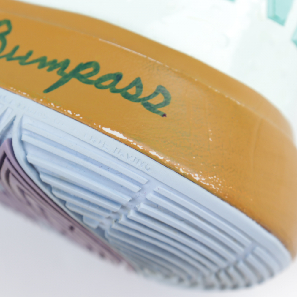 Pair of (2) Rodger Bumpass Signed Kyrie Irving Nike 5