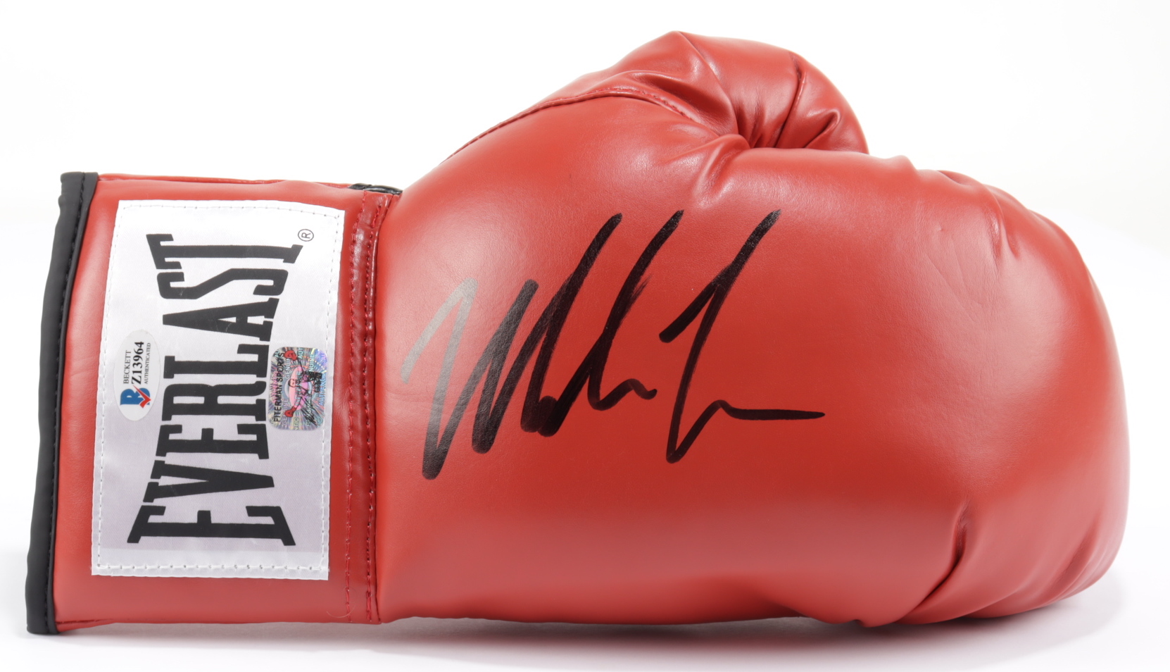 Mike Tyson Signed Everlast Boxing Glove (Beckett Hologram & Tyson Hologram) at PristineAuction.com Mike Tyson Signed Everlast Boxing Glove (Beckett Hologram & Tyson Hologram) at PristineAuction.com