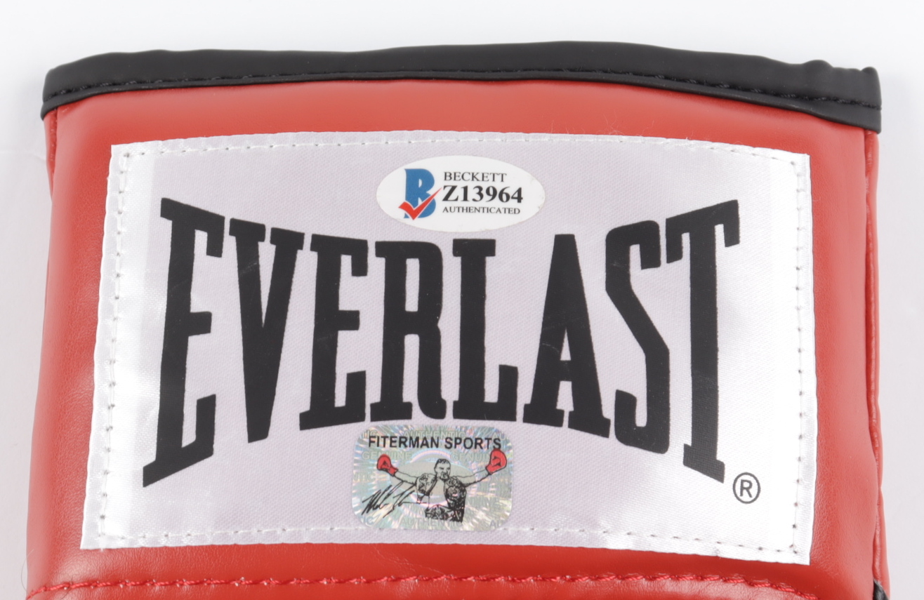 Mike Tyson Signed Everlast Boxing Glove (Beckett Hologram & Tyson Hologram) at PristineAuction.com Mike Tyson Signed Everlast Boxing Glove (Beckett Hologram & Tyson Hologram) at PristineAuction.com