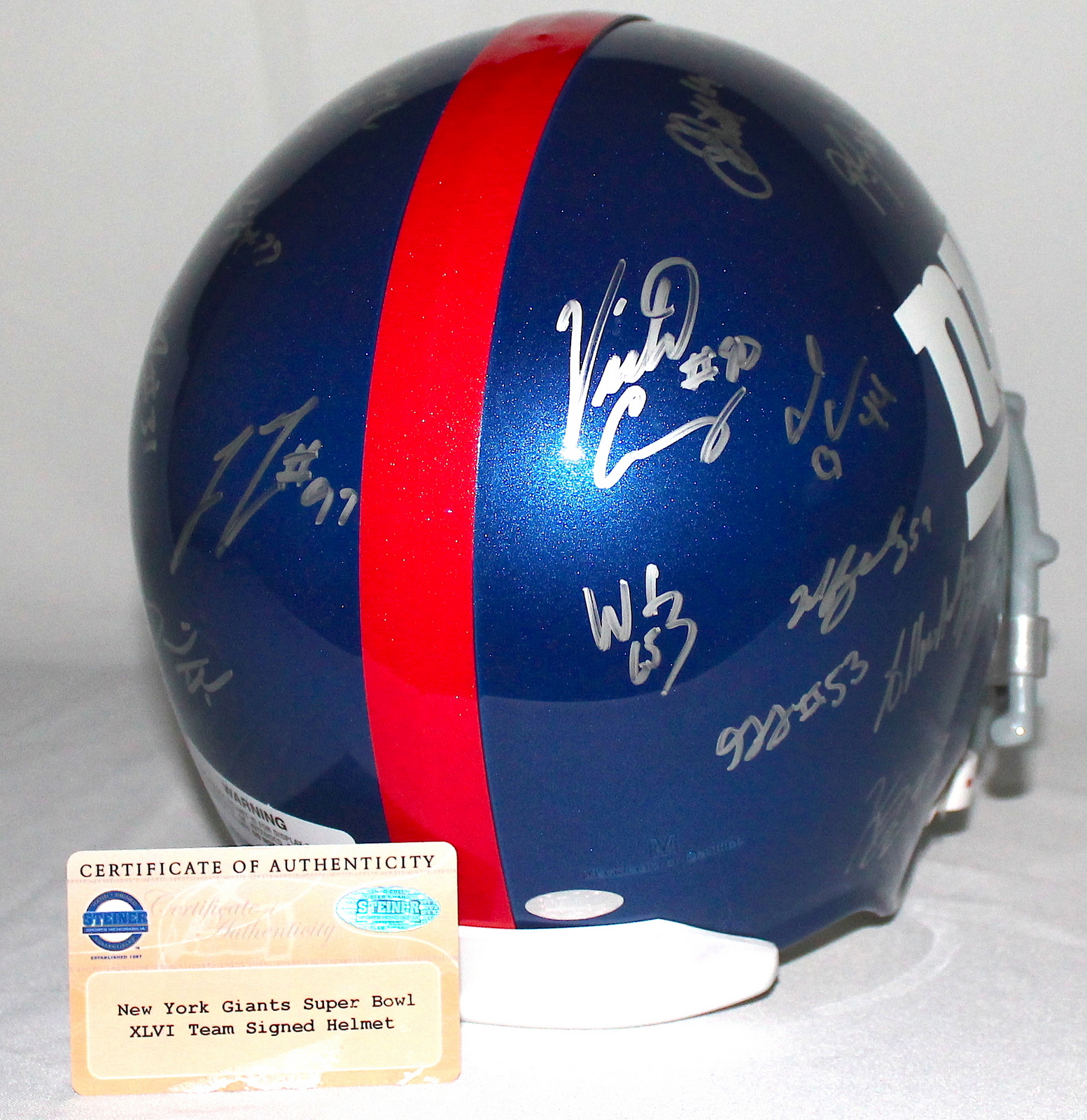 2011-12 Giants Team Signed by (22) with Eli Manning, Victor Cruz, Hakeem Nicks, Justin Tuck, Mario Manningham (Steiner COA) at PristineAuction.com 2011-12 Giants Team Signed by (22) with Eli Manning, Victor Cruz, Hakeem Nicks, Justin Tuck, Mario Manningham (Steiner COA) at PristineAuction.com