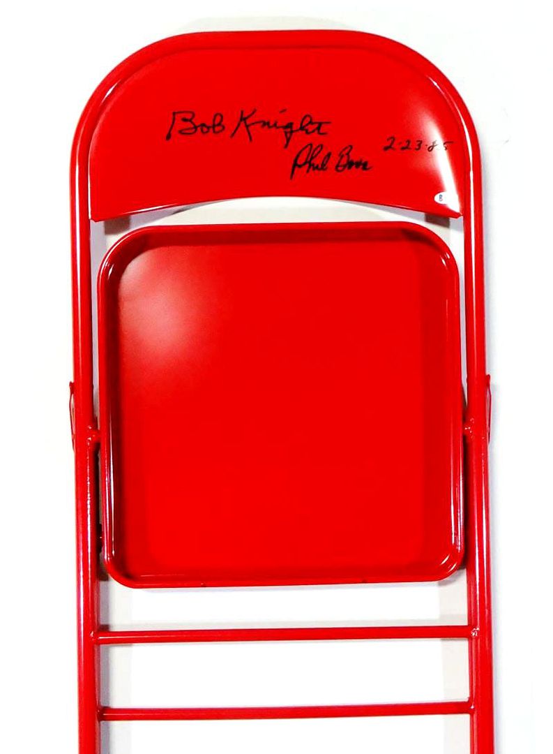 Bobby Knight & Phil Bova Signed Red Metal Folding Chair Inscribed "2-23-85" (Beckett Hologram) at PristineAuction.com Bobby Knight & Phil Bova Signed Red Metal Folding Chair Inscribed "2-23-85" (Beckett Hologram) at PristineAuction.com