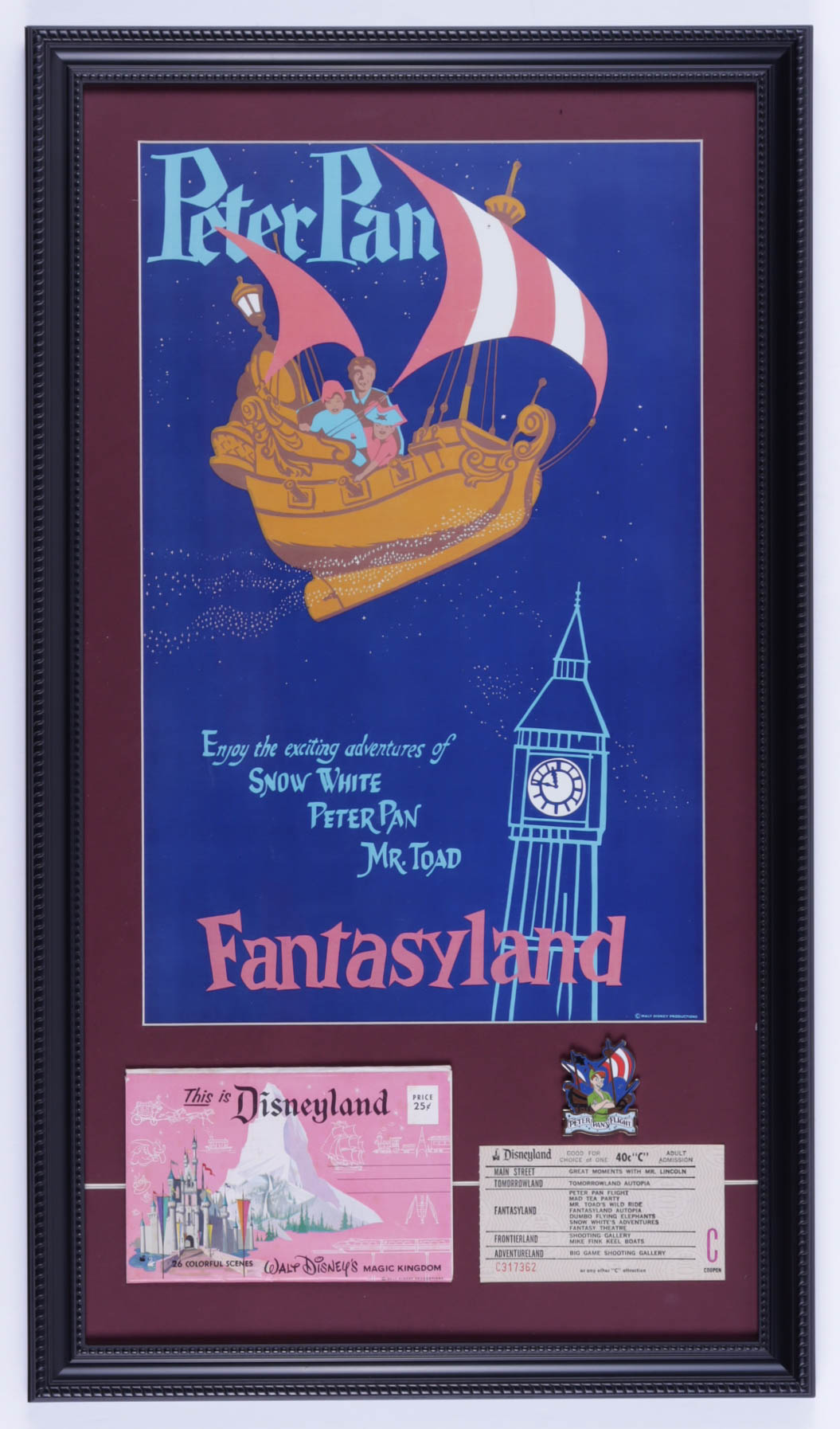 Disneyland Fantasyland's "Peter Pan" 15x26 Custom Framed Print Display with Vintage Disneyland Pin, Vintage Peter Pan C Ride Ticket & Postcard Envelope at PristineAuction.com Disneyland Fantasyland's "Peter Pan" 15x26 Custom Framed Print Display with Vintage Disneyland Pin, Vintage Peter Pan C Ride Ticket & Postcard Envelope at PristineAuction.com