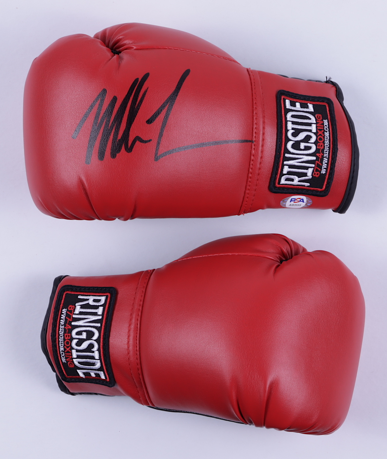 Mike Tyson Signed Ringside Boxing Glove with Phot Display Case (PSA Hologram) at PristineAuction.com Mike Tyson Signed Ringside Boxing Glove with Phot Display Case (PSA Hologram) at PristineAuction.com