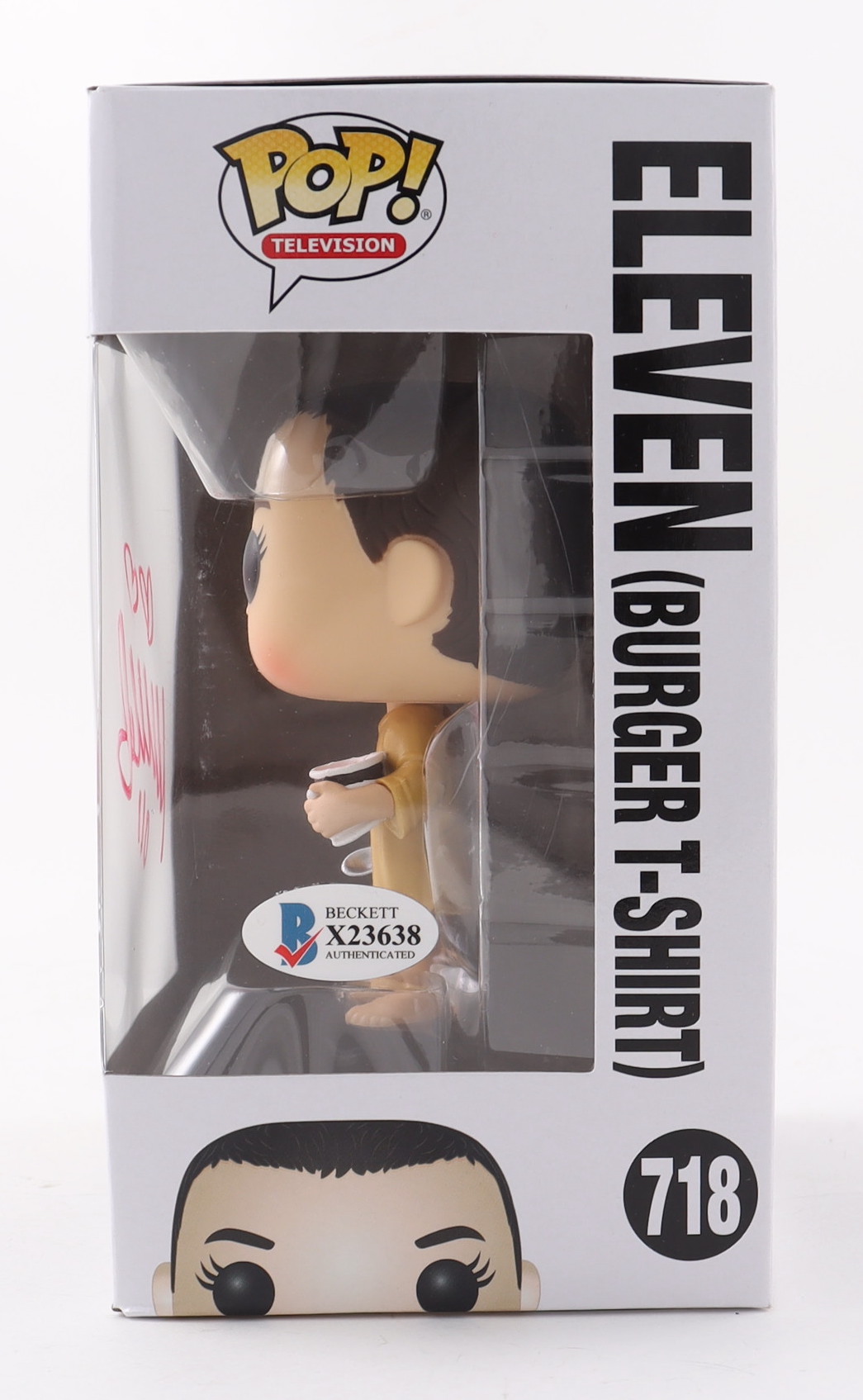 Millie Bobby Brown Signed "Stranger Things" #718 Eleven (Burger T-Shirt) Funko Pop! Vinyl Figure Inscribed "011" (Beckett COA) (See Description) at PristineAuction.com Millie Bobby Brown Signed "Stranger Things" #718 Eleven (Burger T-Shirt) Funko Pop! Vinyl Figure Inscribed "011" (Beckett COA) (See Description) at PristineAuction.com