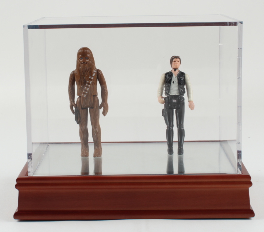 Set of (2) 1977 "Star Wars" Han Solo & Chewbacca Oringinal Figures with Display Case at PristineAuction.com Set of (2) 1977 "Star Wars" Han Solo & Chewbacca Oringinal Figures with Display Case at PristineAuction.com