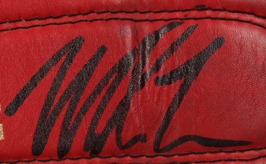 Mike Tyson Signed Pair of Everlast Boxing Gloves with Hand Wrap & Display Case (PSA COA) at PristineAuction.com Mike Tyson Signed Pair of Everlast Boxing Gloves with Hand Wrap & Display Case (PSA COA) at PristineAuction.com