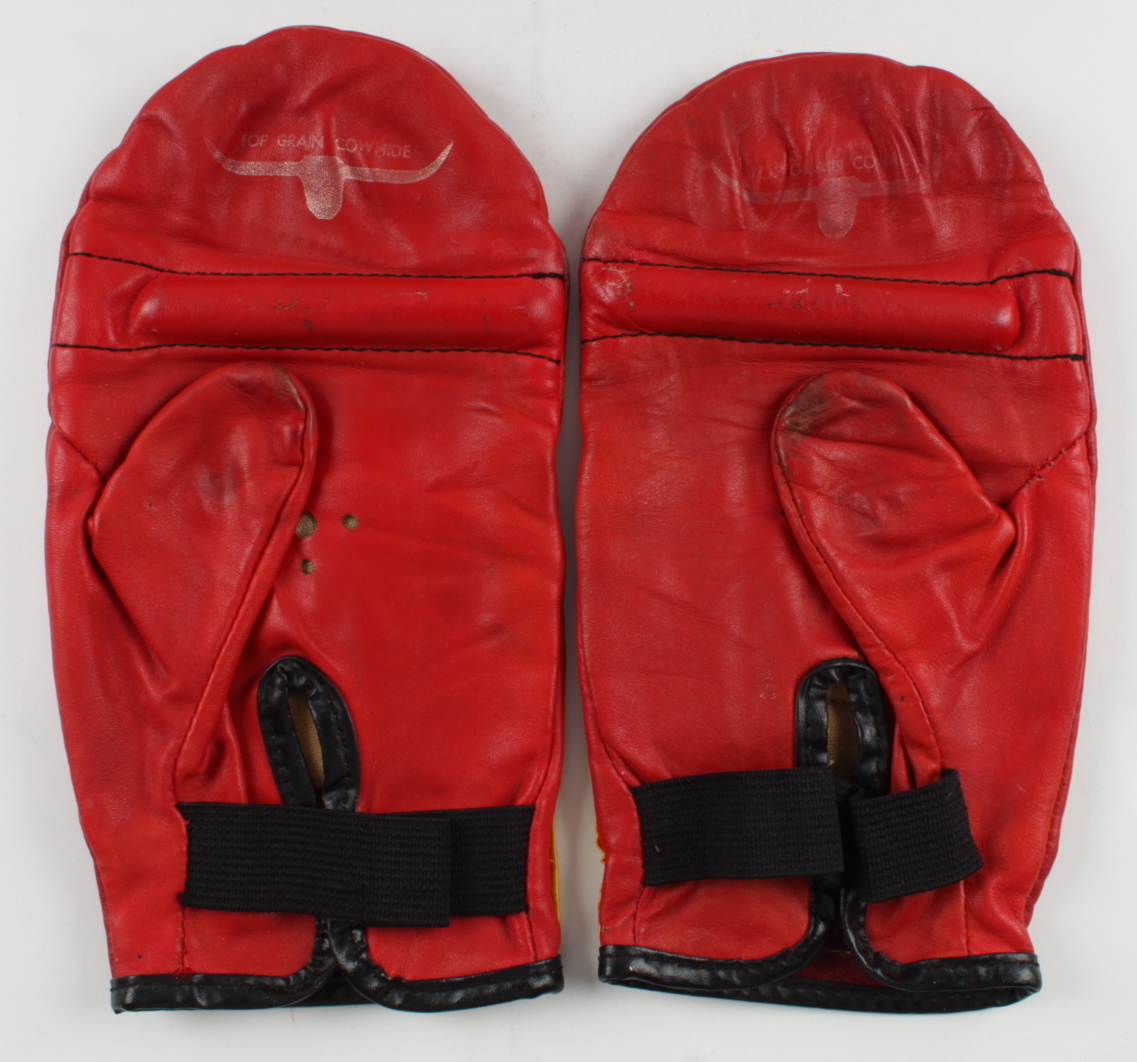 Mike Tyson Signed Pair of Everlast Boxing Gloves with Hand Wrap & Display Case (PSA COA) at PristineAuction.com Mike Tyson Signed Pair of Everlast Boxing Gloves with Hand Wrap & Display Case (PSA COA) at PristineAuction.com