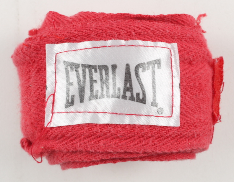 Mike Tyson Signed Pair of Everlast Boxing Gloves with Hand Wrap & Display Case (PSA COA) at PristineAuction.com Mike Tyson Signed Pair of Everlast Boxing Gloves with Hand Wrap & Display Case (PSA COA) at PristineAuction.com