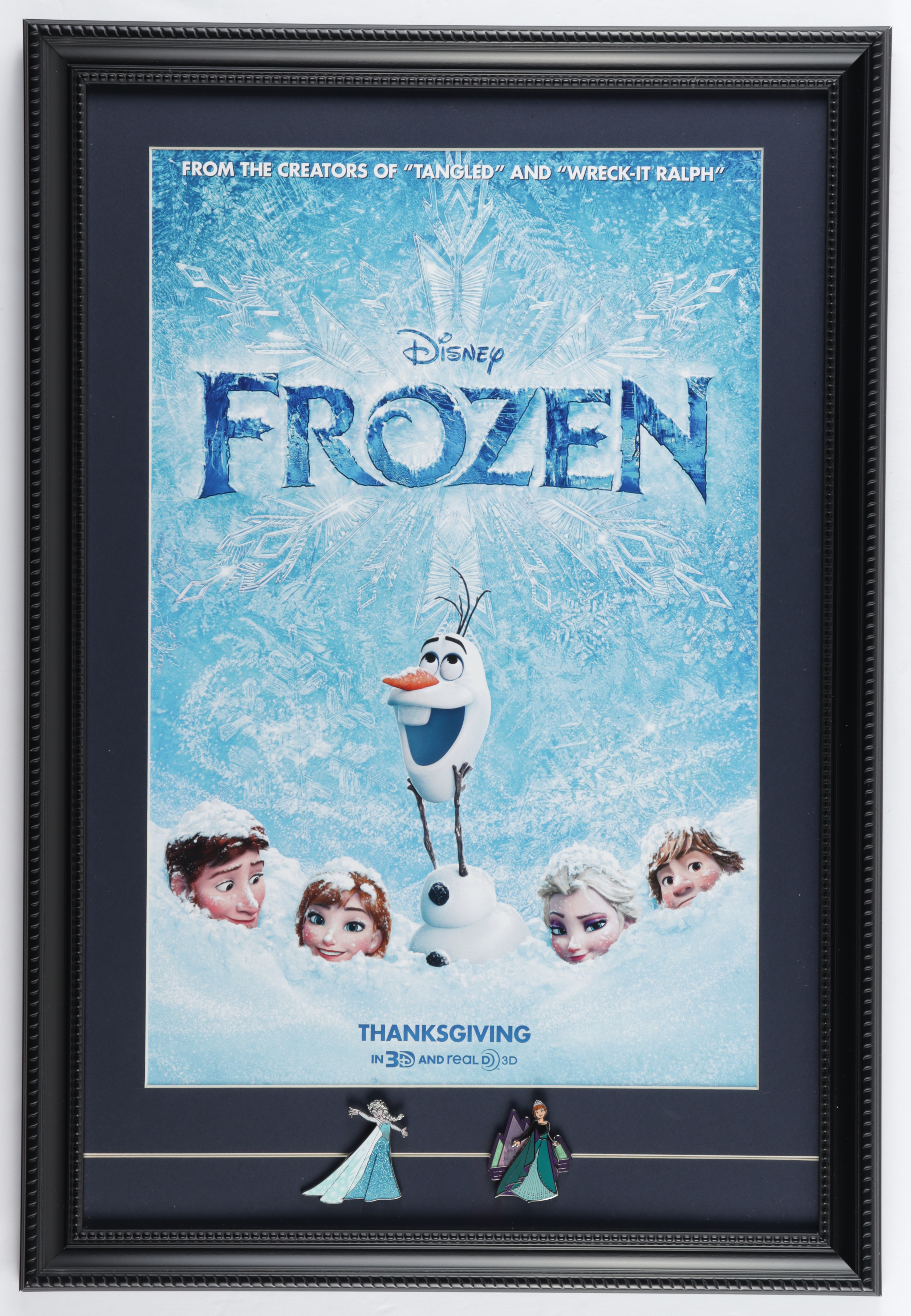 "Frozen" 15x22 Custom Framed Movie Poster Display with (2) Movie Pins at PristineAuction.com "Frozen" 15x22 Custom Framed Movie Poster Display with (2) Movie Pins at PristineAuction.com