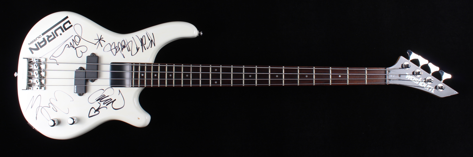 "Duran Duran" 46" Full-Size Electric Bass Guitar Signed by (4) with Simon Le Bon, Nick Rhodes, John Taylor & Warren Cuccurullo (JSA Hologram) at PristineAuction.com "Duran Duran" 46" Full-Size Electric Bass Guitar Signed by (4) with Simon Le Bon, Nick Rhodes, John Taylor & Warren Cuccurullo (JSA Hologram) at PristineAuction.com