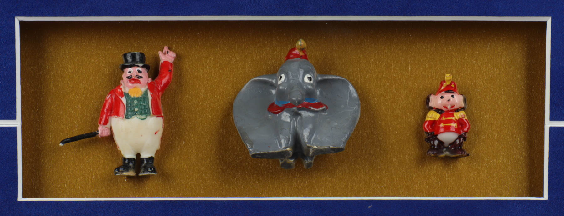 Walt Disney's "Dumbo" 15x23x1 Custom Framed Shadowbox Print Display with 1960 Ceramic Figurines Set Of (3) (See Description) at PristineAuction.com Walt Disney's "Dumbo" 15x23x1 Custom Framed Shadowbox Print Display with 1960 Ceramic Figurines Set Of (3) (See Description) at PristineAuction.com