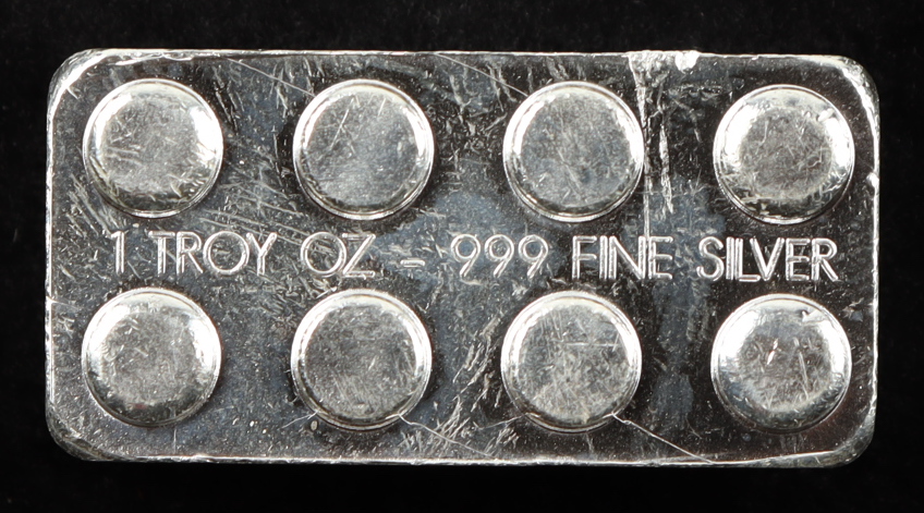1 Troy oz .999 Fine Silver Lego Bullion Bar at PristineAuction.com 1 Troy oz .999 Fine Silver Lego Bullion Bar at PristineAuction.com