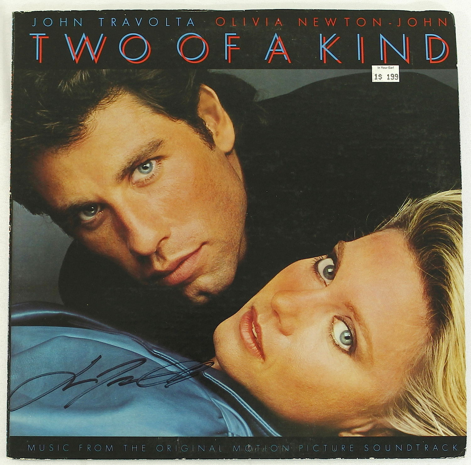 John Travolta Signed "Two of A Kind" Original Movie Soundtrack Vintage LP Record Album (PA LOA) at PristineAuction.com John Travolta Signed "Two of A Kind" Original Movie Soundtrack Vintage LP Record Album (PA LOA) at PristineAuction.com