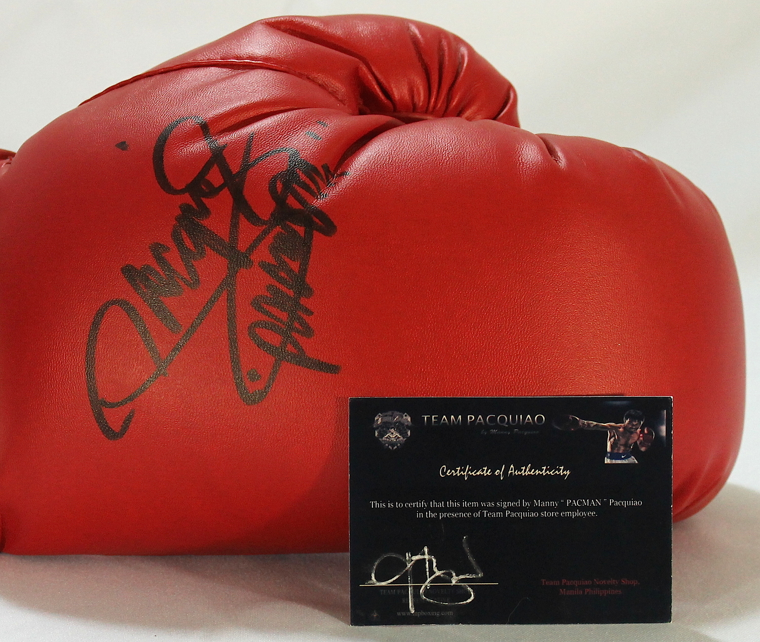 Manny Pacquiao Signed Boxing Glove Inscribed "Pacman" (Pacquiao COA) at PristineAuction.com Manny Pacquiao Signed Boxing Glove Inscribed "Pacman" (Pacquiao COA) at PristineAuction.com