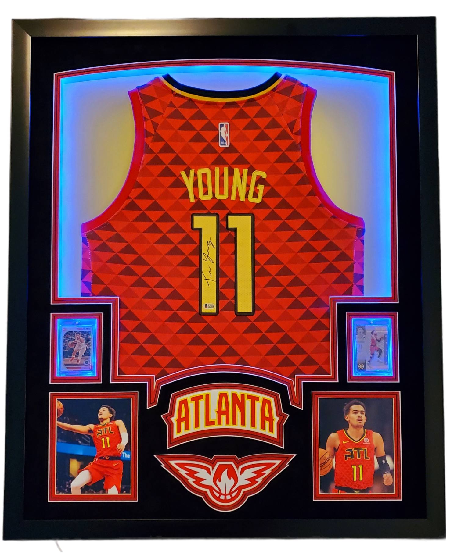 Trae Young Signed 35x43 Custom Framed Jersey Display with 2019-20 Hoops Premium Stock #1 & 2019-20 Panini Illusions #136 (Beckett LOA) at PristineAuction.com Trae Young Signed 35x43 Custom Framed Jersey Display with 2019-20 Hoops Premium Stock #1 & 2019-20 Panini Illusions #136 (Beckett LOA) at PristineAuction.com