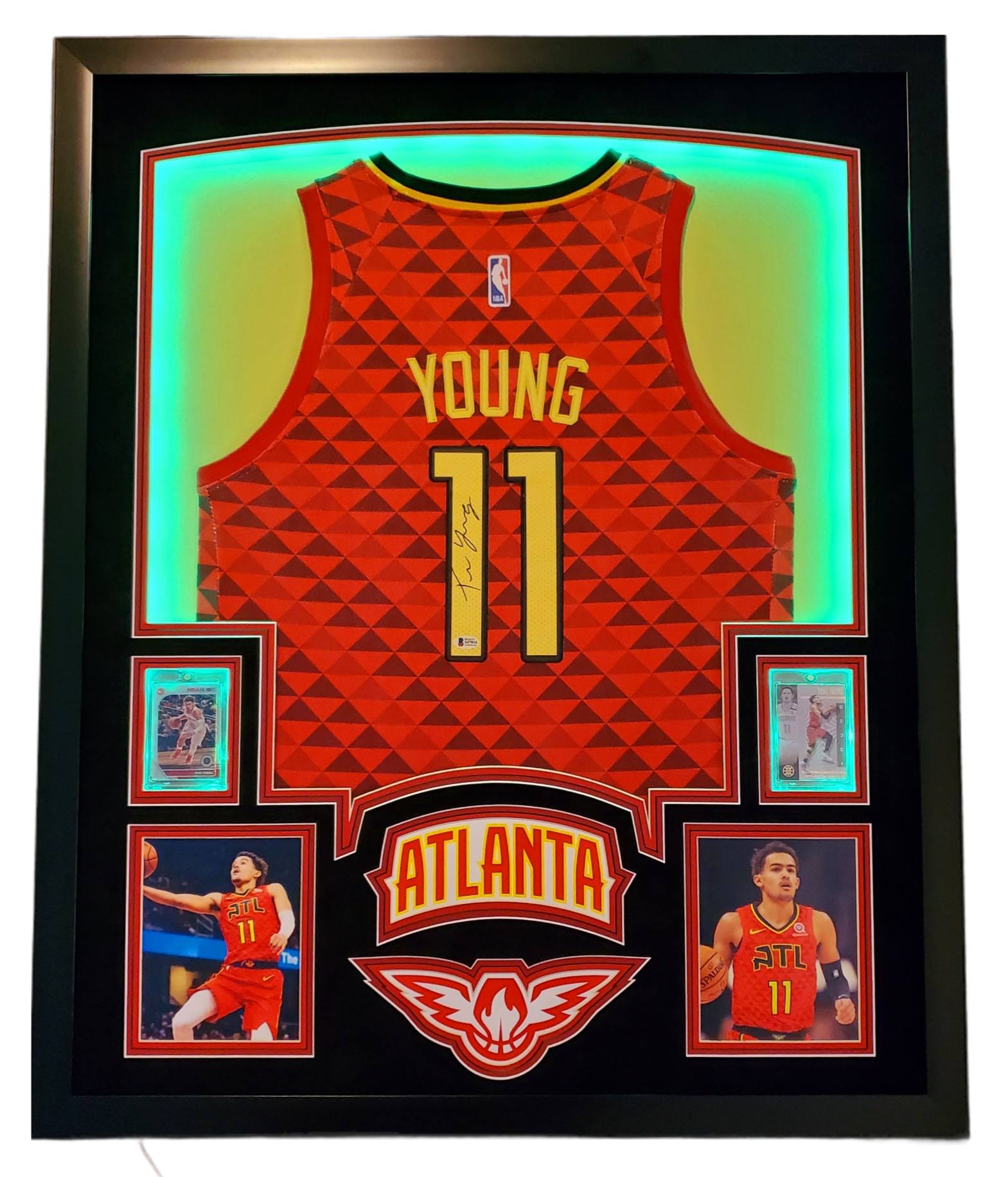 Trae Young Signed 35x43 Custom Framed Jersey Display with 2019-20 Hoops Premium Stock #1 & 2019-20 Panini Illusions #136 (Beckett LOA) at PristineAuction.com Trae Young Signed 35x43 Custom Framed Jersey Display with 2019-20 Hoops Premium Stock #1 & 2019-20 Panini Illusions #136 (Beckett LOA) at PristineAuction.com