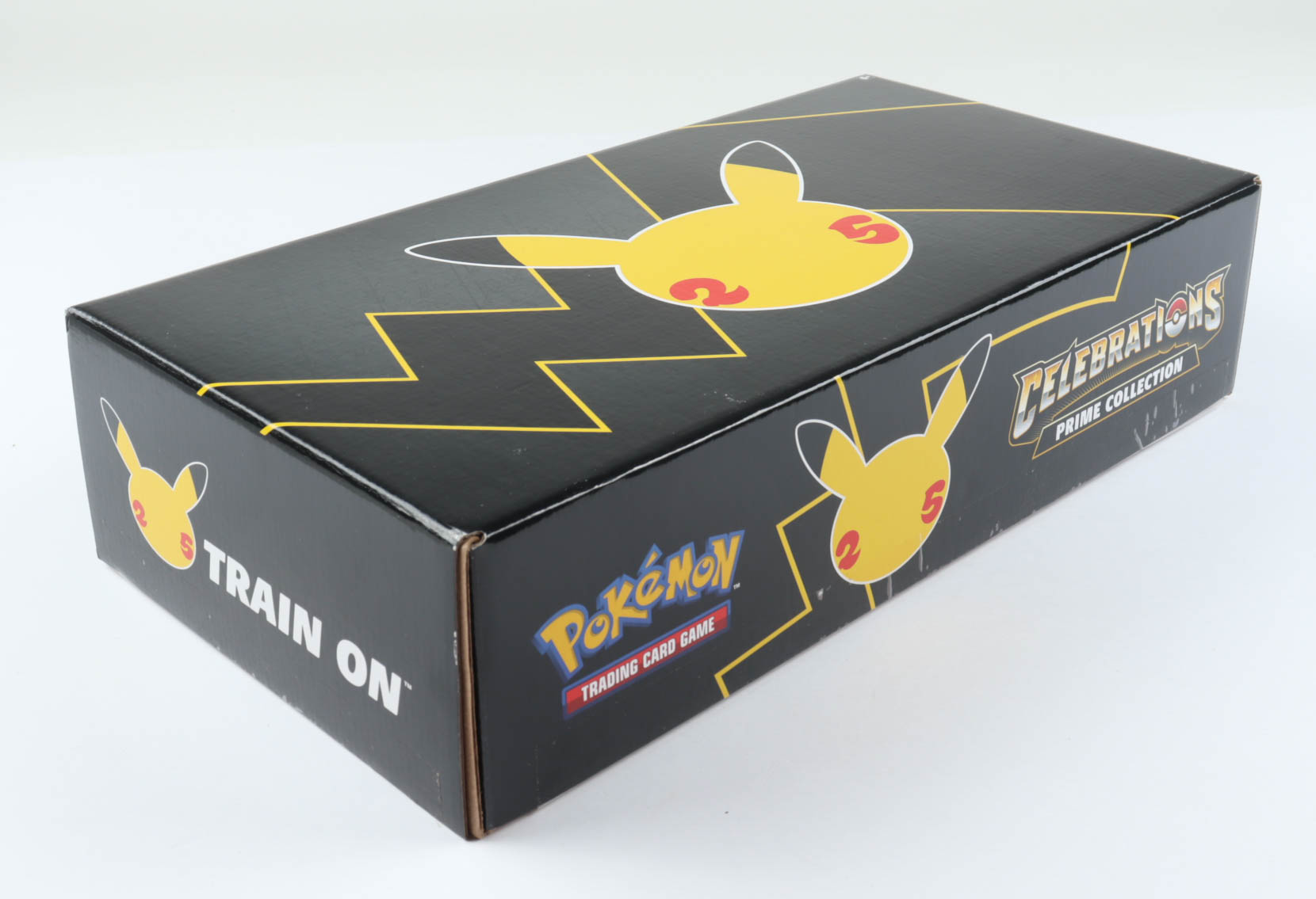 Pokemon TCG: Celebrations Prime Collection Box with (5) Booster Packs at PristineAuction.com Pokemon TCG: Celebrations Prime Collection Box with (5) Booster Packs at PristineAuction.com