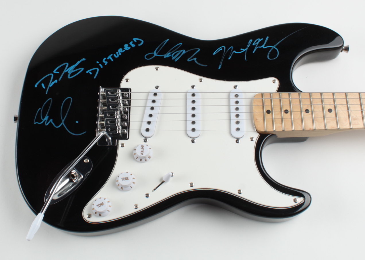 "Disturbed " 40" Full-Size Electric Guitar Signed by (4) with David Draiman, Dan Donegan, John Moyer & Mike Wengren Inscribed "DISTURBED" (AutographCOA Hologram) at PristineAuction.com "Disturbed " 40" Full-Size Electric Guitar Signed by (4) with David Draiman, Dan Donegan, John Moyer & Mike Wengren Inscribed "DISTURBED" (AutographCOA Hologram) at PristineAuction.com